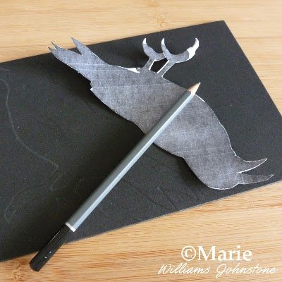Drawing around a printed template onto paper