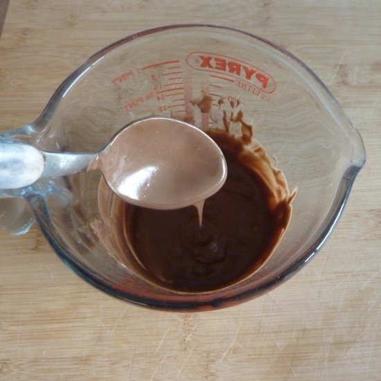 Melt your baking chocolate in the microwave in a microwave suitable container or over the stove melted baking chocolate in a pyrex glass jug