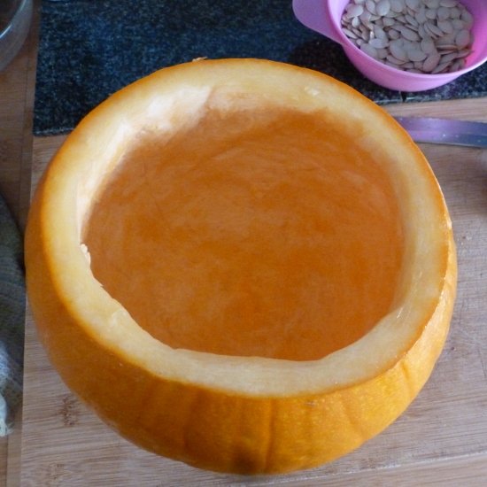 thinning the pumpkin inside ready for carving it