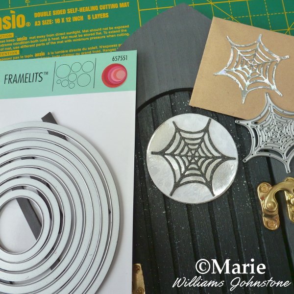 Adding a spiderweb window detail to the altered art wood door