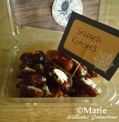 Dates stuffed with a cream cheese filling and served as stuffed roaches