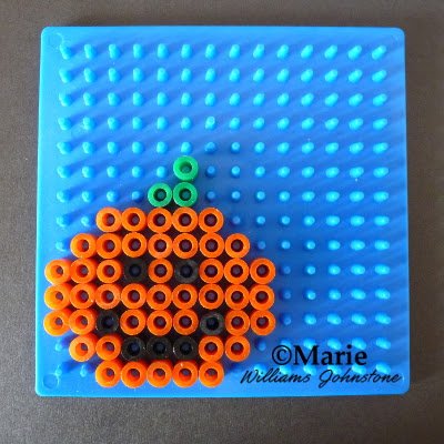 orange smiling pumpkin pattern perler fused beads design