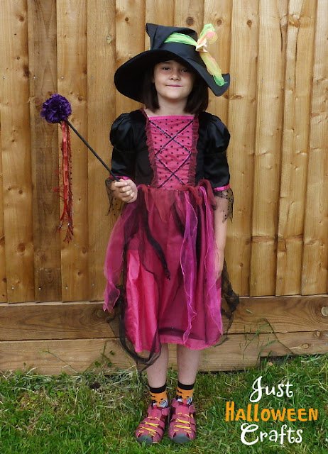 Child dressing up as a witch for Halloween