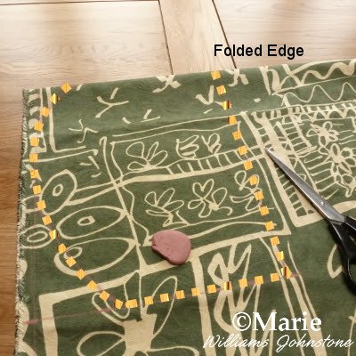 Marking out fabric using pink tailor's chalk