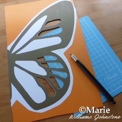 Cut away the white unprinted sections