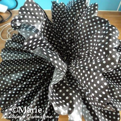 Black polka dot paper for a craft
