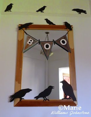 wood mirror frame with boo garland banner black bird decorations