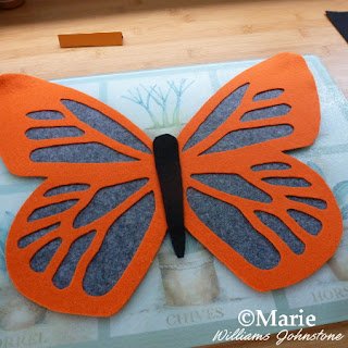 Black, gray and orange Halloween style butterfly design