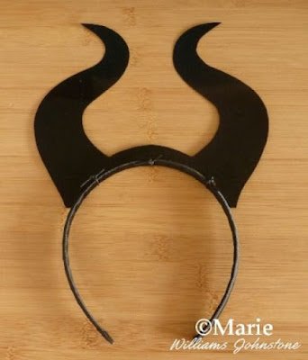 A black costume head band 