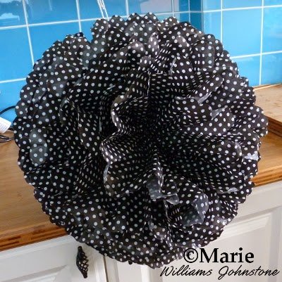 Finished ball of paper ready to hang up