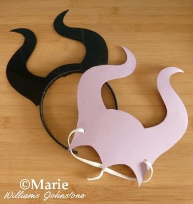 Two sets of paper masks in black and purple