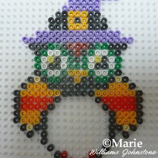 Striped orange beads for the wings