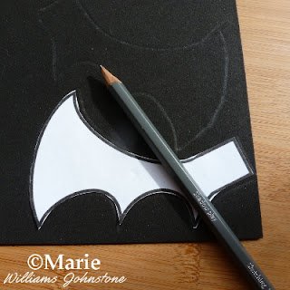Wing template, pencil and black craft foam
